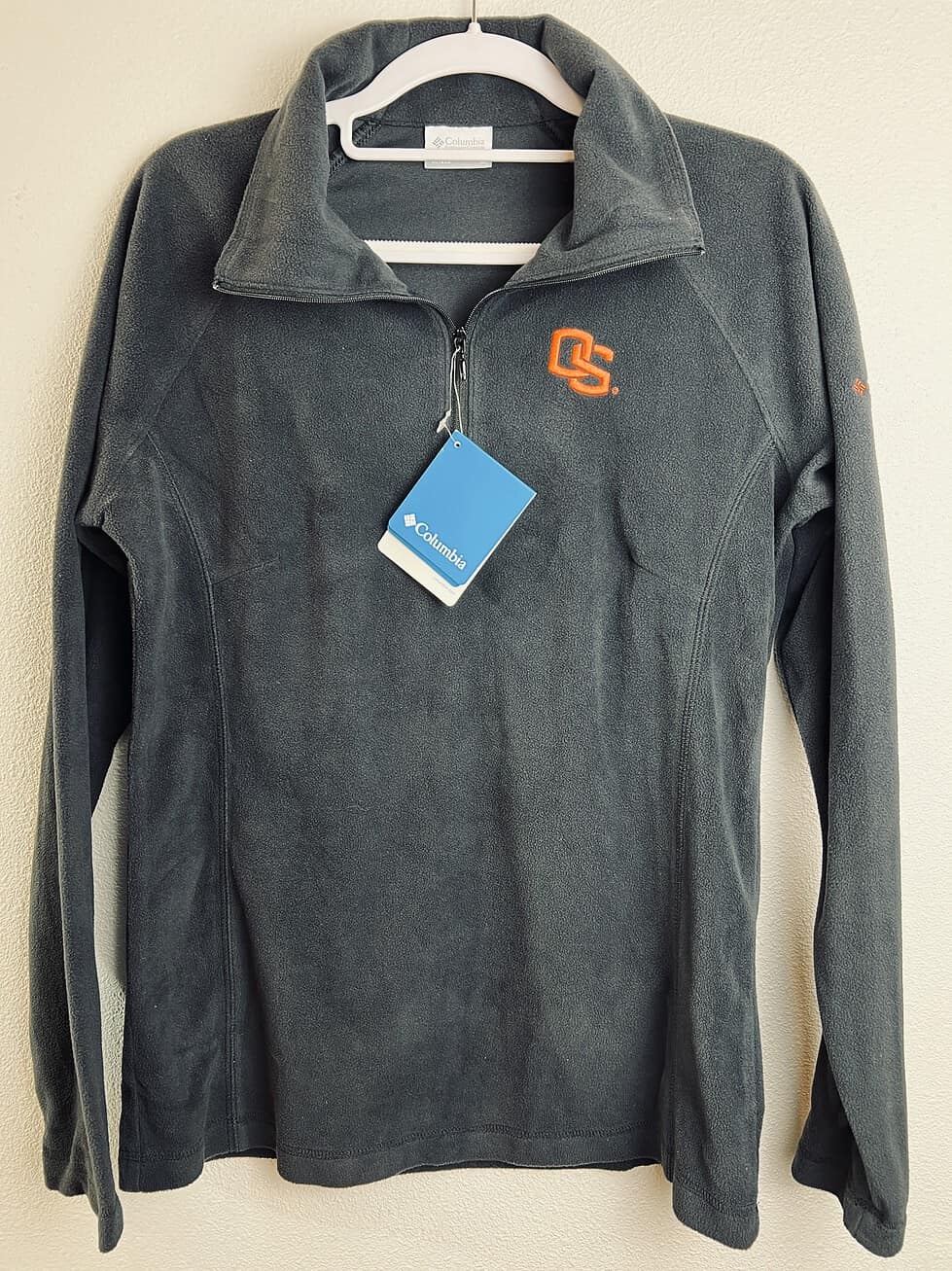Front view of Oregon State Columbia charcoal gray fleece pullover with orange OS logo.