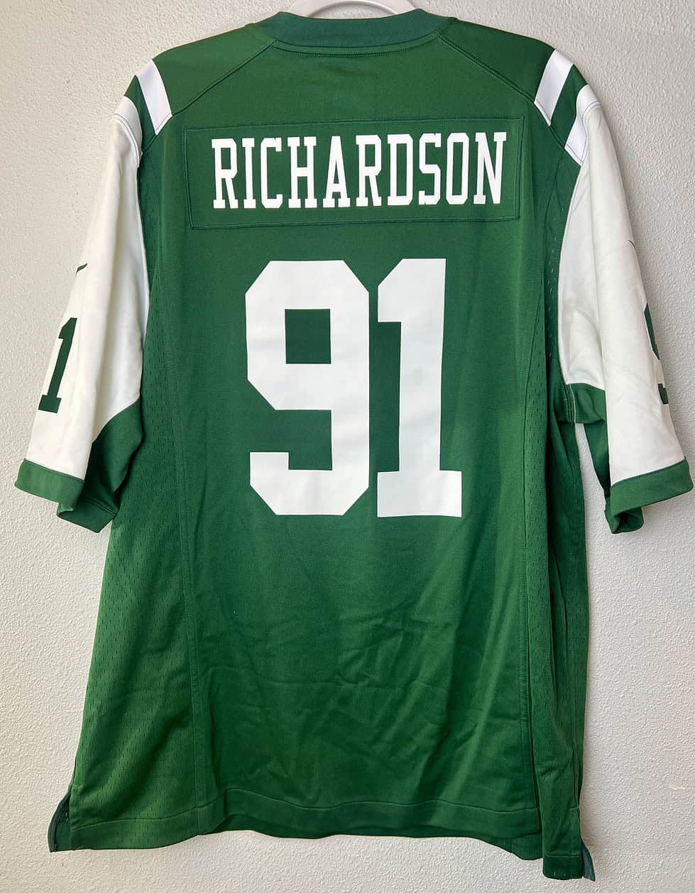 Back view of NY Jets green jersey showing "Richardson" nameplate and #91.