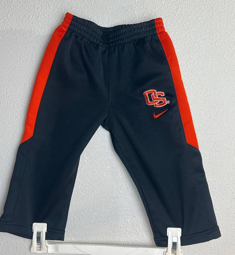 Nike Oregon State Beavers baby pants, size 12M, black with orange side panels