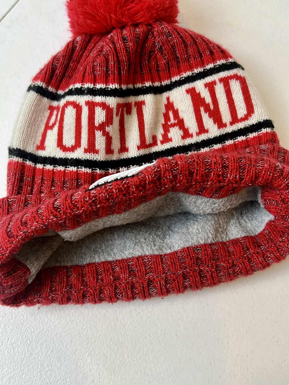 Interior fleece lining detail of Portland Trail Blazers beanie, showing no wear.