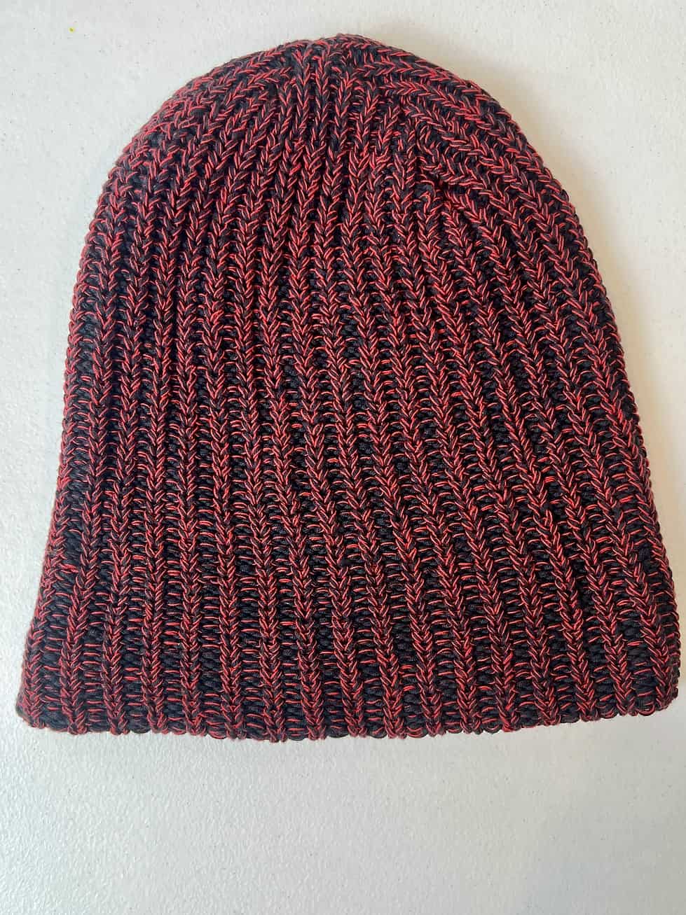 Side view of Trail Blazers Love Your Melon beanie with logo patch detail.