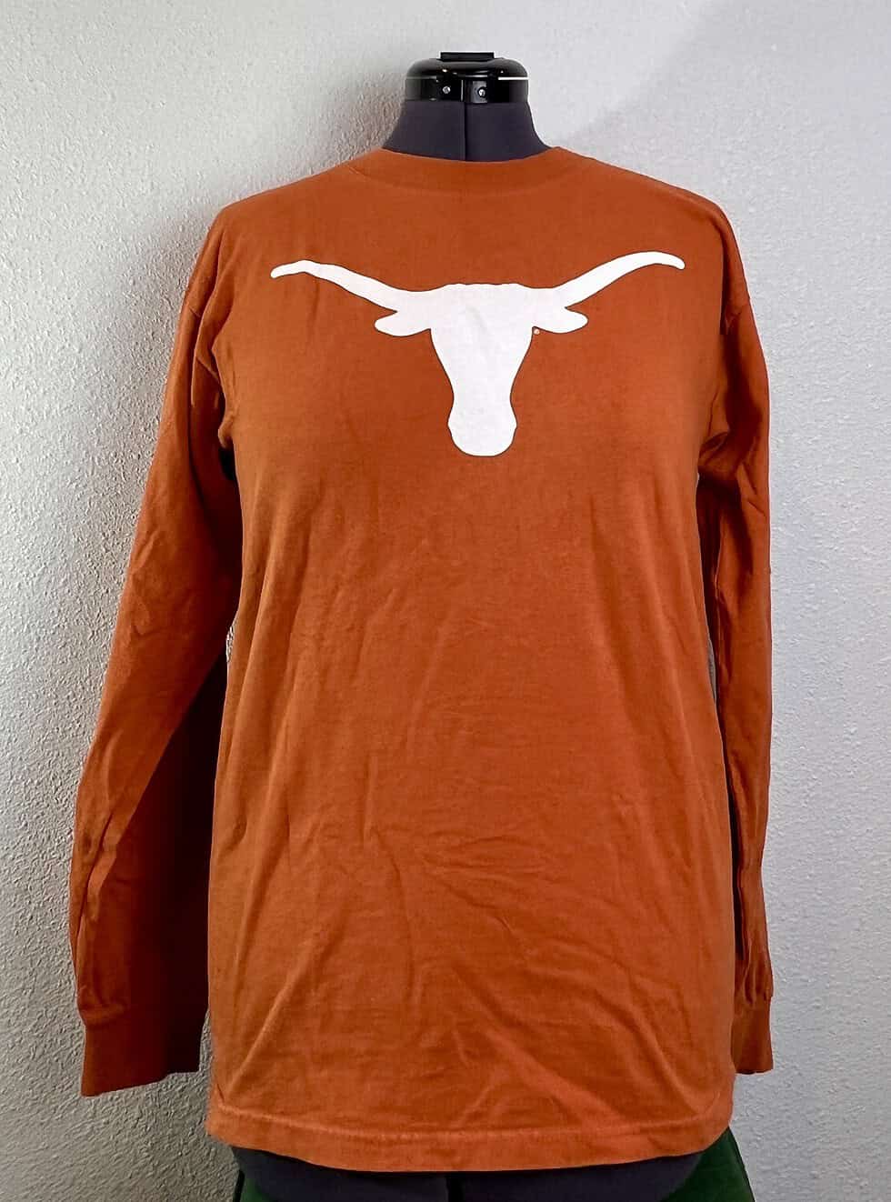 Texas Longhorns burnt orange long-sleeve shirt with Longhorns logo, perfect for UT fans.