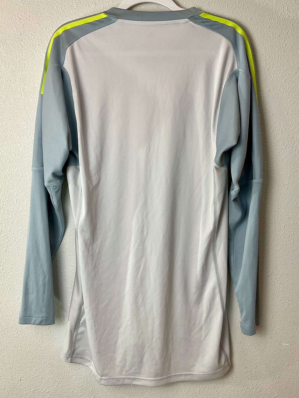 Back view of the jersey showing clean white panel.