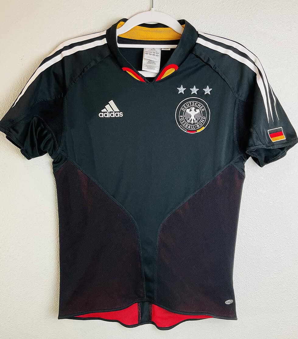 Front view of Germany 2008 Adidas away jersey with three stars and crest.