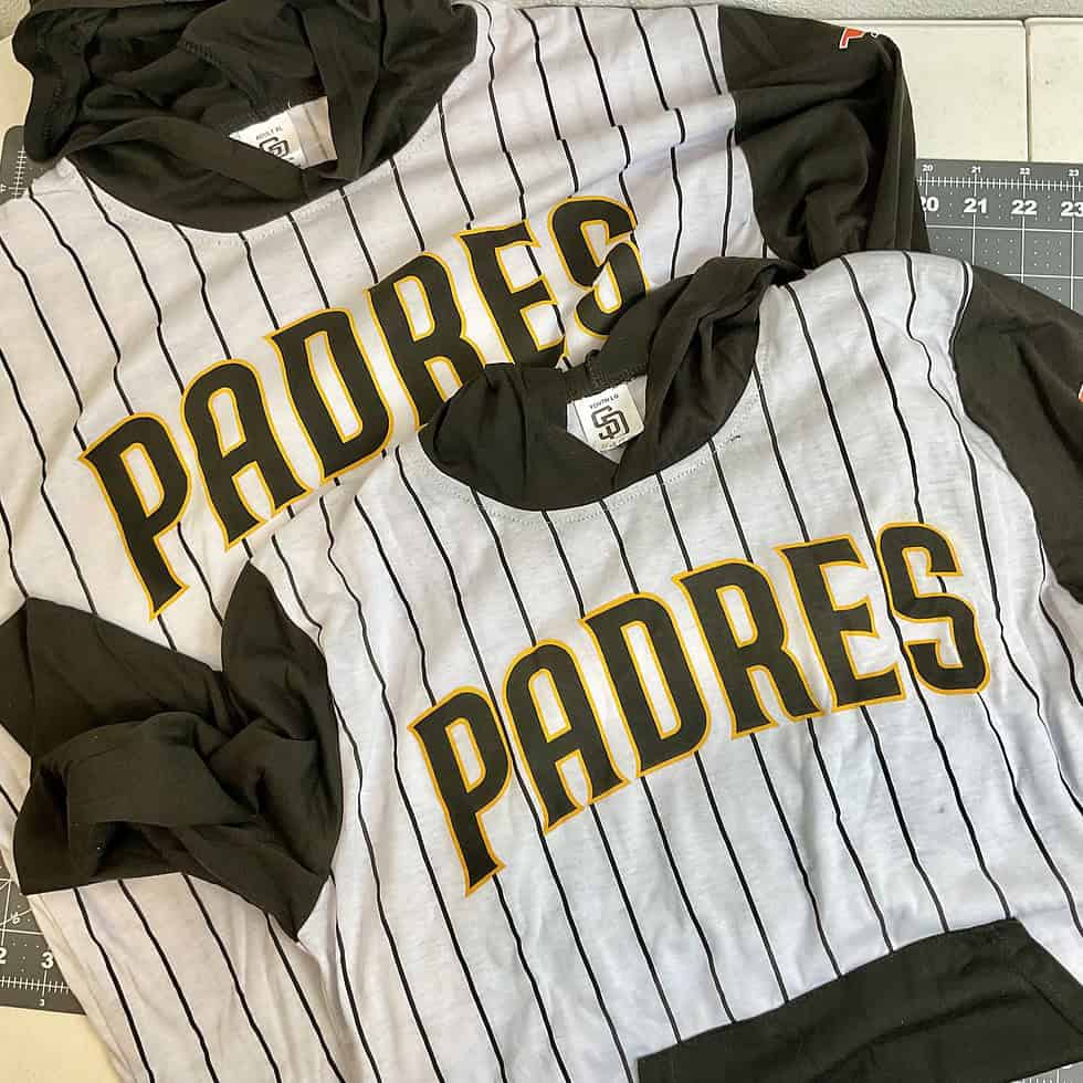Adult XL and Youth Large Padres hoodies displayed together for a matching game-day look.