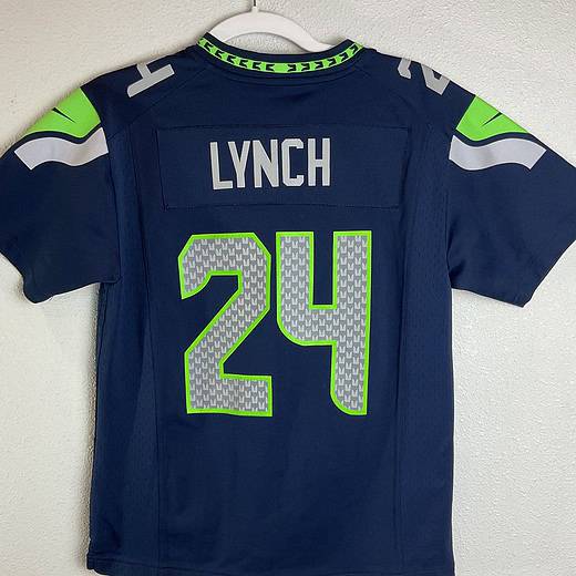 Back view of jersey with “LYNCH” nameplate and number 24.