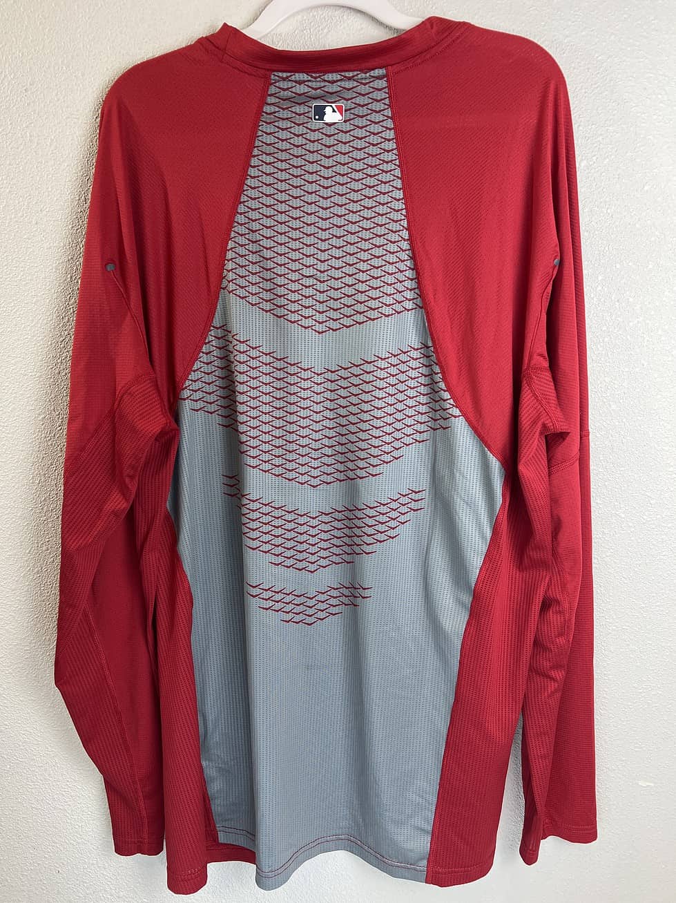 Back view of Cardinals Nike Pro shirt showing mesh panel with MLB logo detail