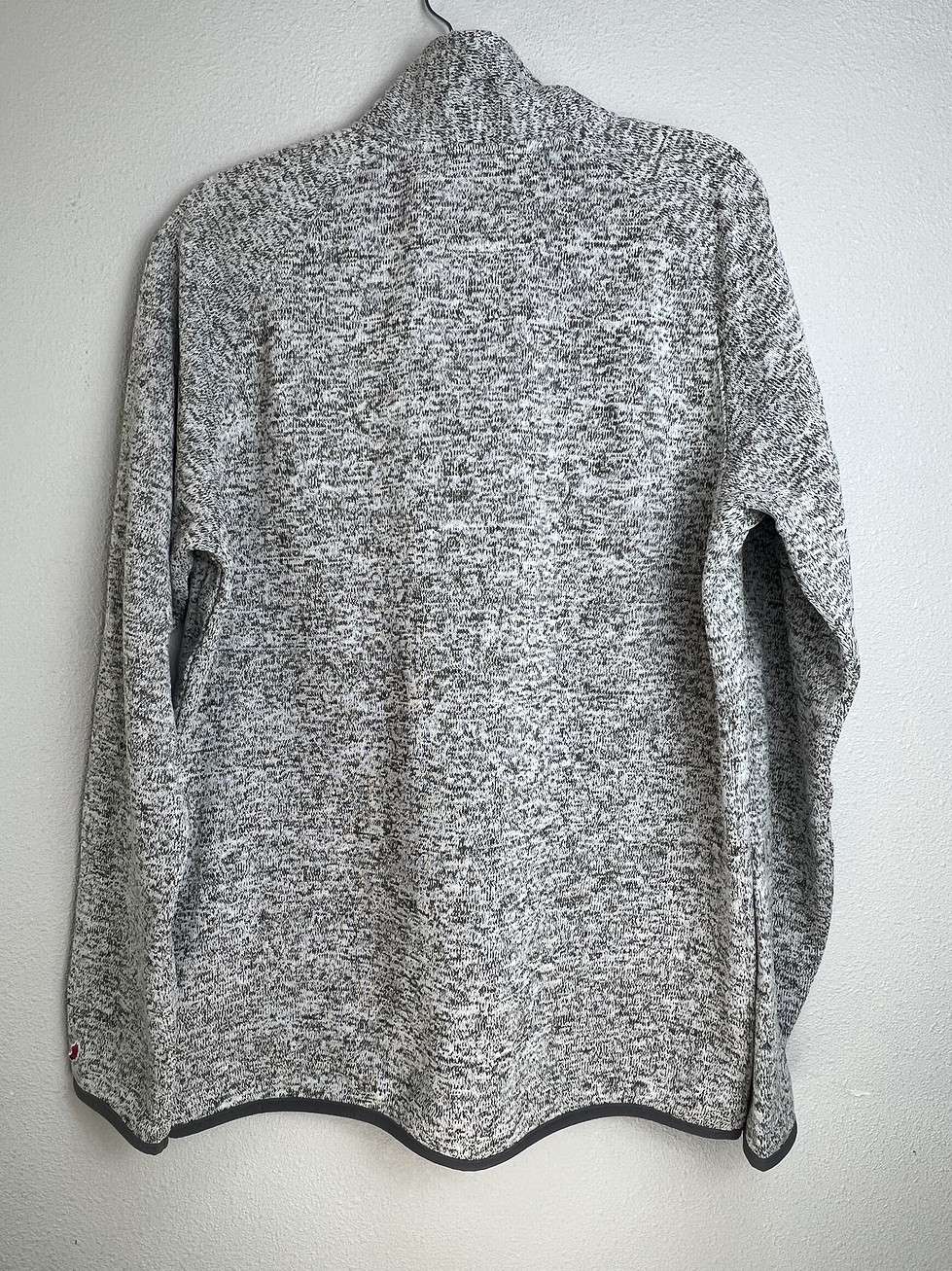 Back view of cozy heathered Nebraska Huskers quarter-zip pullover.