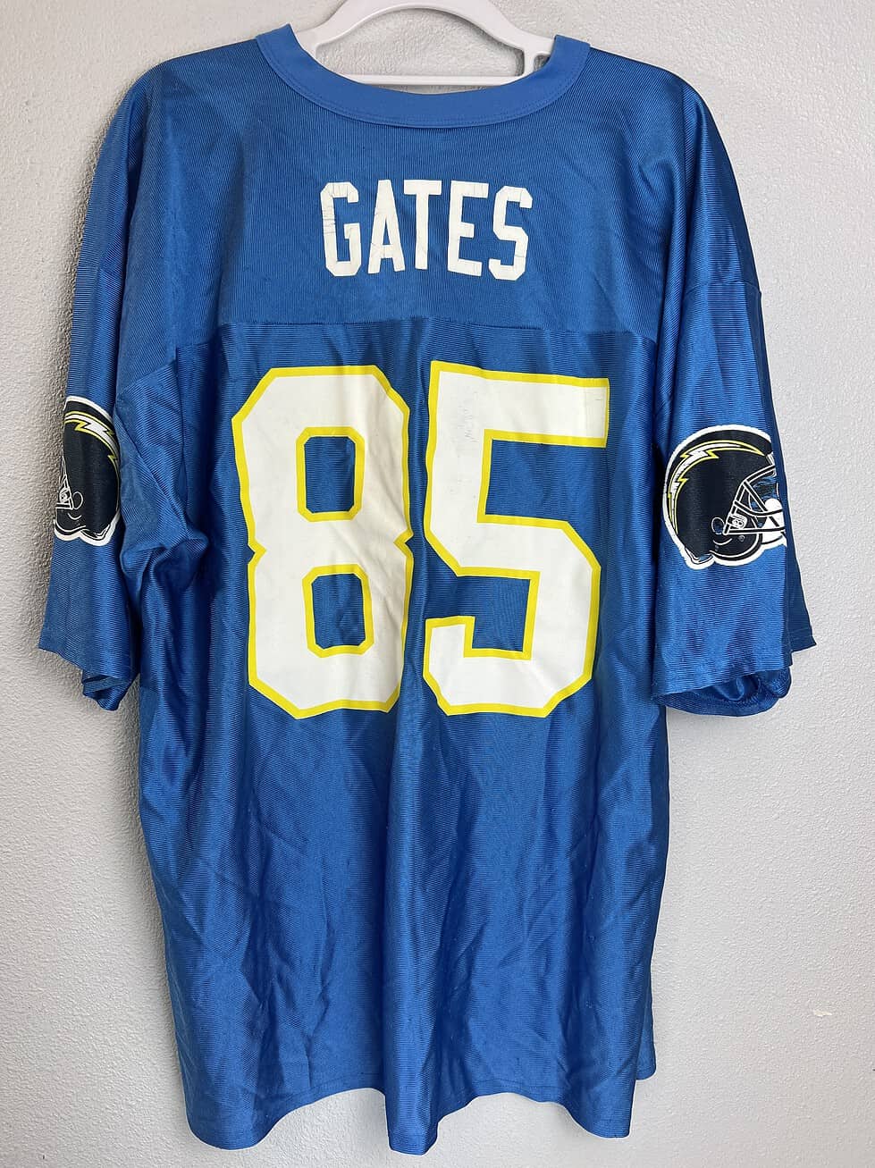 Back view showing “GATES” nameplate and #85 on vintage Chargers jersey