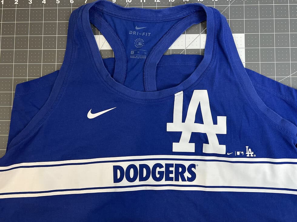 Close-up of Dodgers Nike Dri-FIT logo and graphic on blue tank.