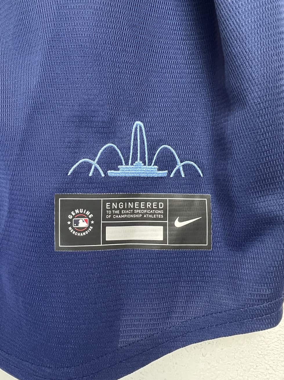 Close-up of Nike MLB engineered patch and Kansas City fountain detail.