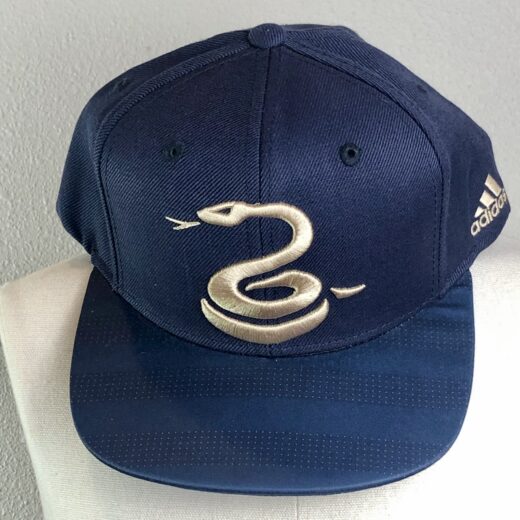 Navy Adidas Philadelphia Union hat with an embroidered gold serpent logo, structured fit, and curved brim.