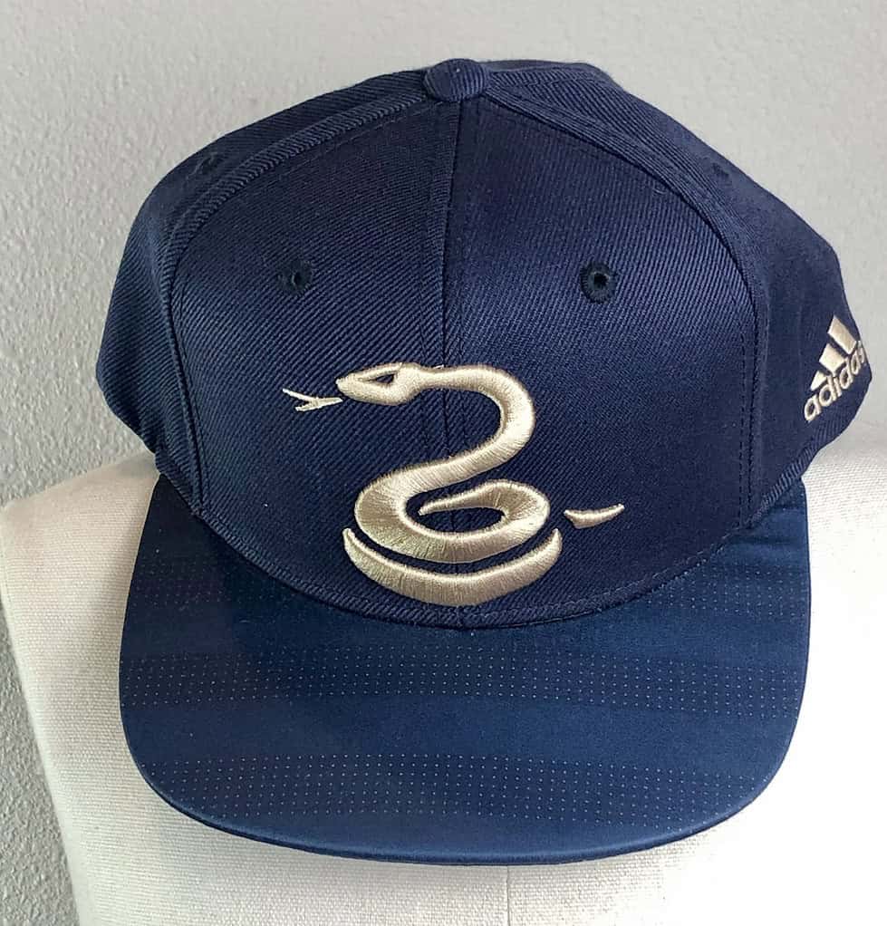 Navy Adidas Philadelphia Union hat with an embroidered gold serpent logo, structured fit, and curved brim.