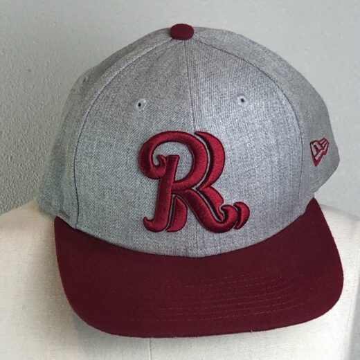 Frisco RoughRiders New Era fitted hat with heather gray crown and burgundy brim, featuring an embroidered script “R” logo on the front.