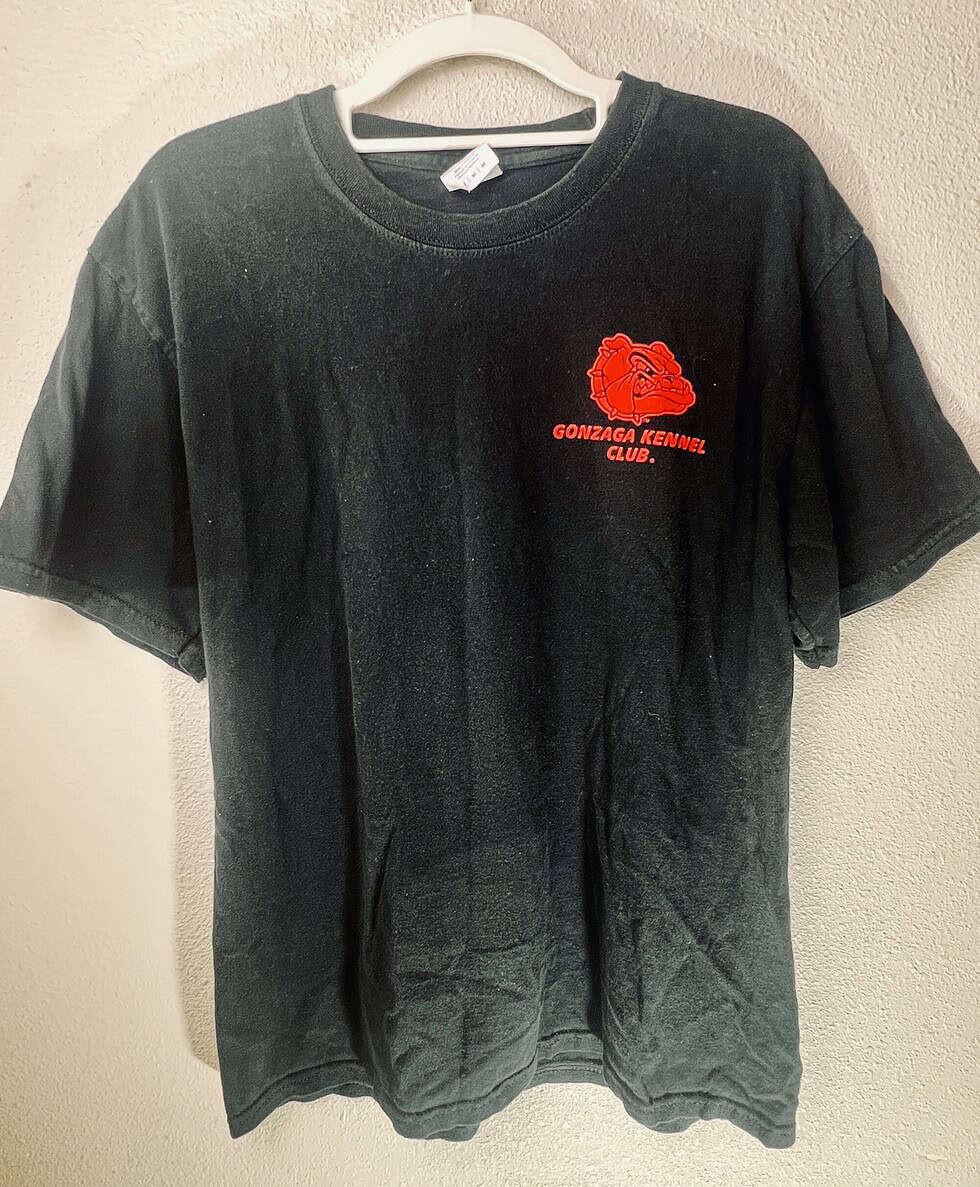 Full view of Gonzaga Bulldogs Kennel Club tee hanging on white hanger