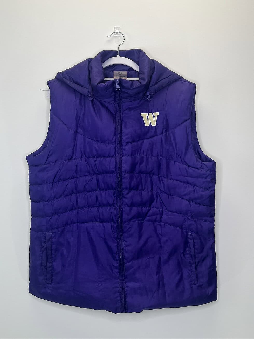 Front view of purple University of Washington Huskies puffer vest by Colosseum, size XL