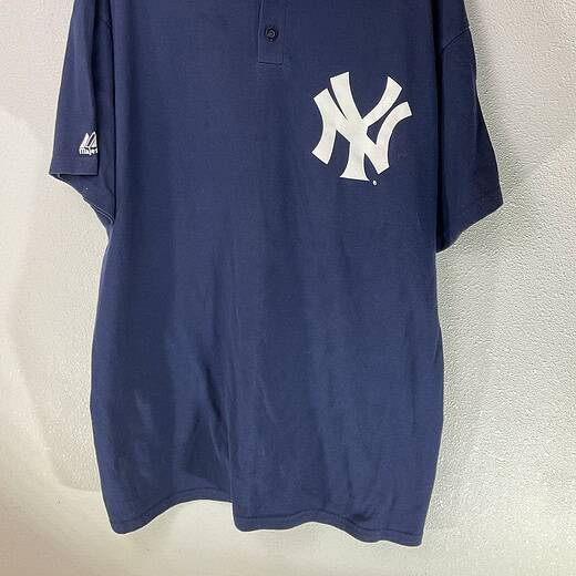 Front view of navy blue New York Yankees Majestic Henley T-shirt with white NY logo