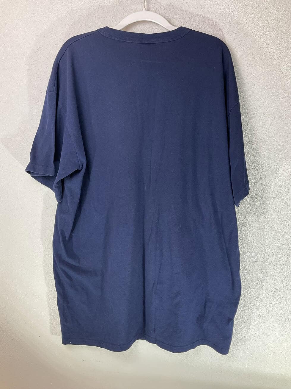 Back view of XL Yankees Majestic tee showing solid navy color and relaxed fit