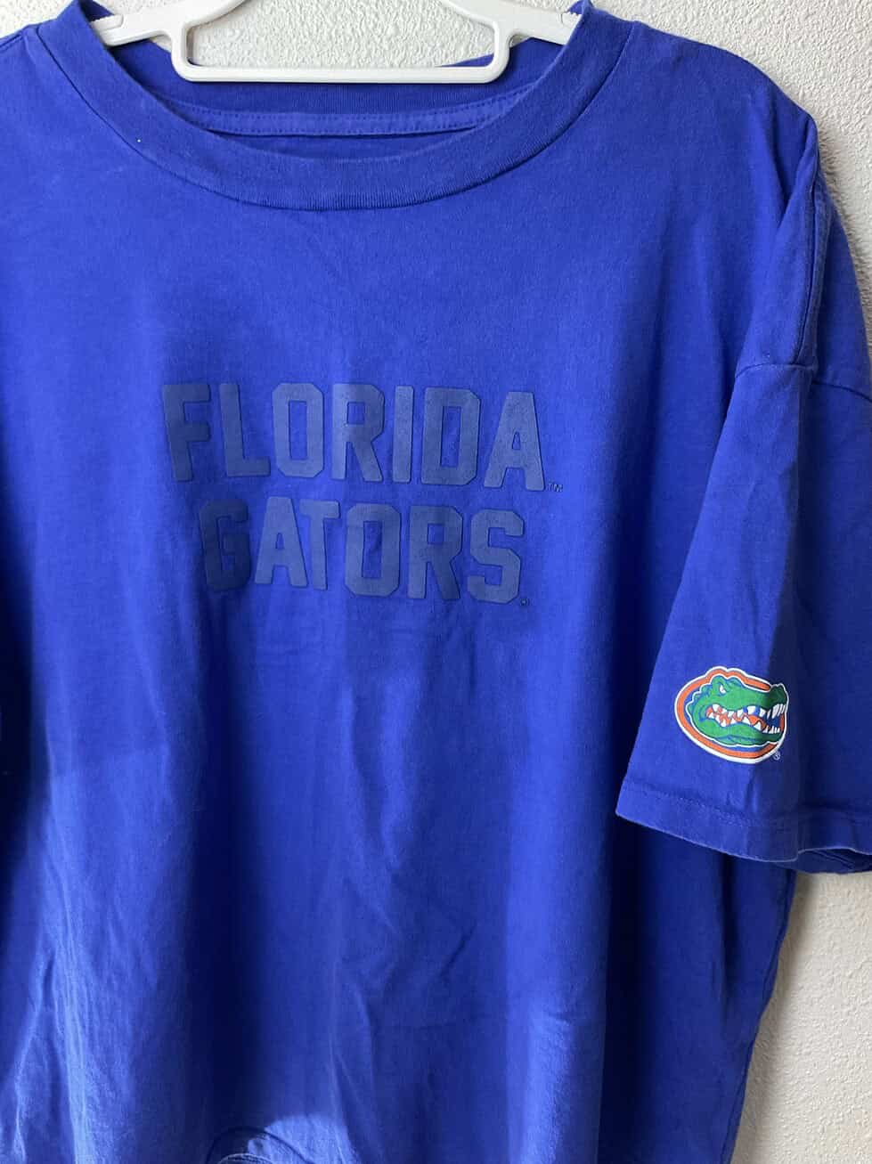 Front close-up of tonal “FLORIDA GATORS” text and sleeve logo patch