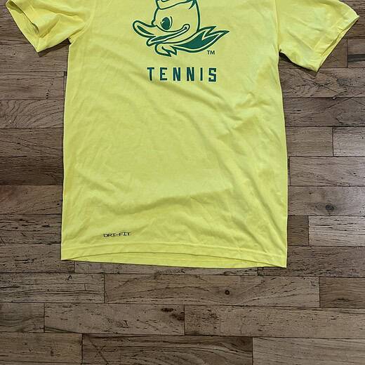 Classic yellow with green Duck logo and “TENNIS” text