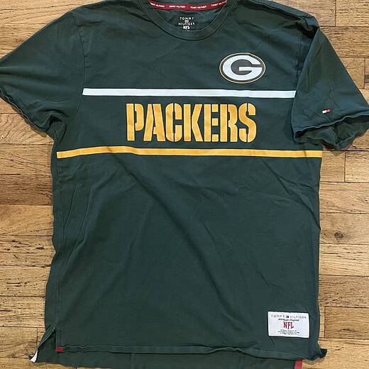 Front view of Tommy Hilfiger Green Bay Packers NFL tee with team logo and stripe design